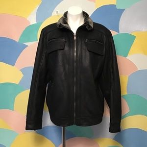Never worn Calvin Klein black Jacket leather faux Fur size L